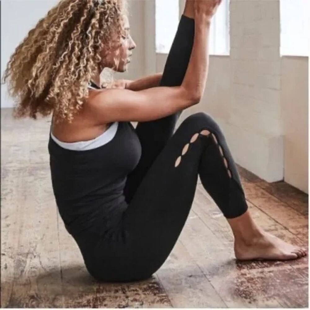 Athleta Black Yoga Leggings Side Cut Out Mesh-Hem Size M